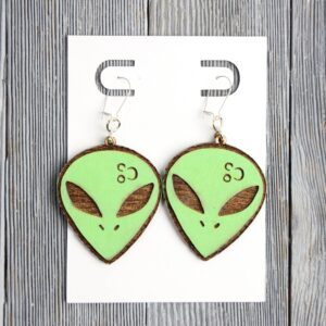 Alien Head Wood Earrings. These earrings are made with 1/8″ thickness basswood. These earrings are lightweight and hand painted.