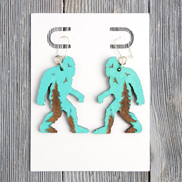 Bigfoot Turquoise Forest Wood Earrings. These earrings are made with 1/8″ thickness basswood. These earrings are lightweight and hand painted.