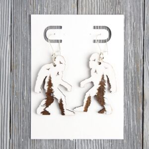 Bigfoot White Forest Wood Earrings. These earrings are made with 1/8″ thickness basswood. These earrings are lightweight and hand painted.