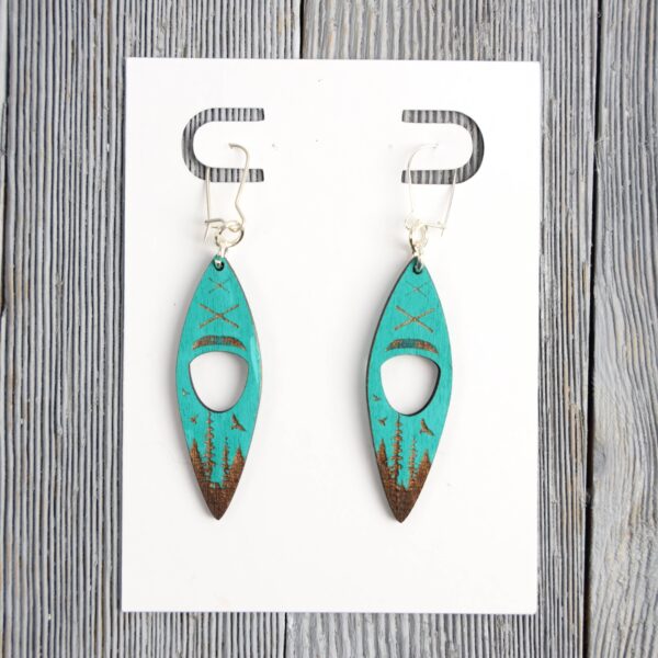 Kayak Turquoise Wood Earrings. These earrings are made with 1/8″ thickness basswood. These earrings are lightweight and hand painted.