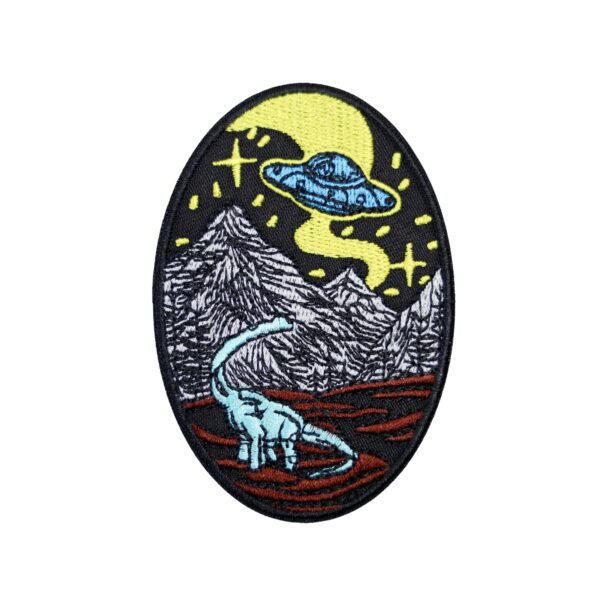 Alien dinosaur patch with spaceship, mountains, and dinosaur.