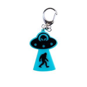 Bigfoot abduction neon blue bag tag with black ship and black backing.