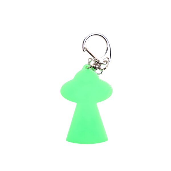 Bigfoot abduction neon green bag tag with black ship and black backing.