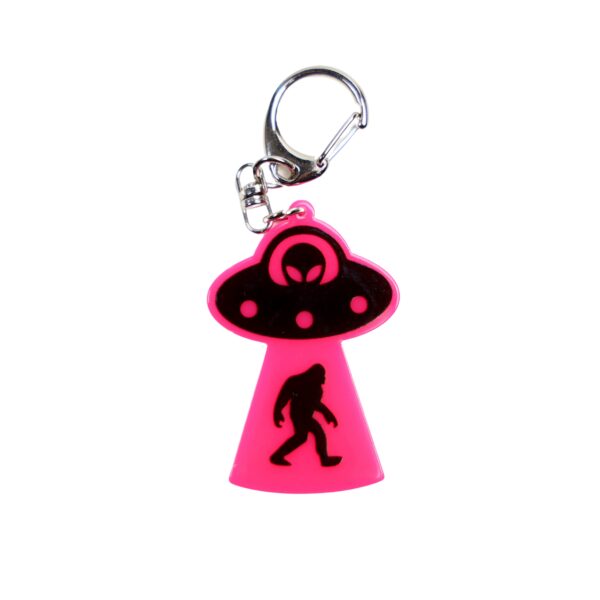 Bigfoot abduction neon pink bag tag with black ship and black backing.