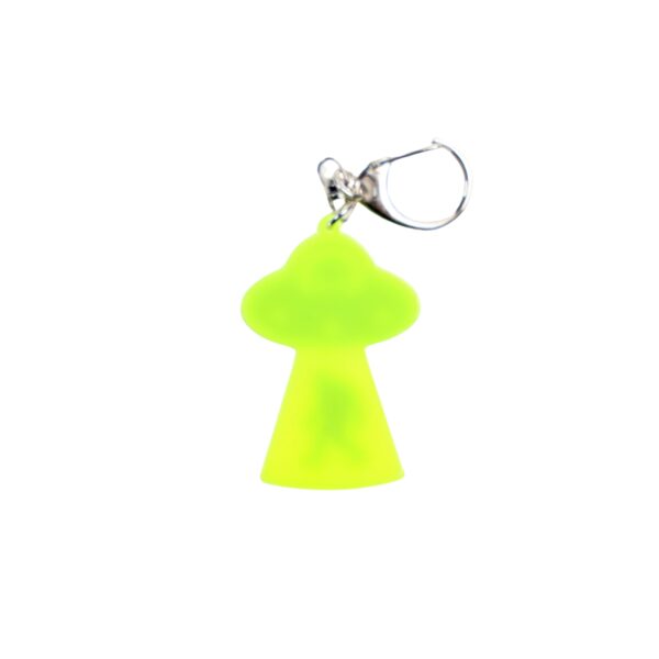 Bigfoot abduction neon yellow bag tag with black ship and black backing.