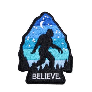 Bigfoot arrowhead believe patch in black, blue, and with a moon.