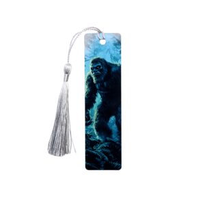 Bigfoot forest bookmark with bigfoot in green and blues.