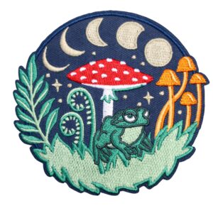 Forest mushroom frog patch with greens, golds, and mushrooms with moons.