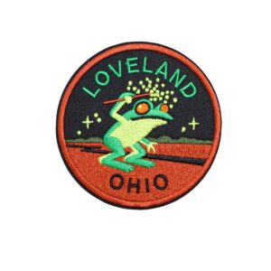 Loveland Ohio Frog patch with frog in greens with black and dark orange.