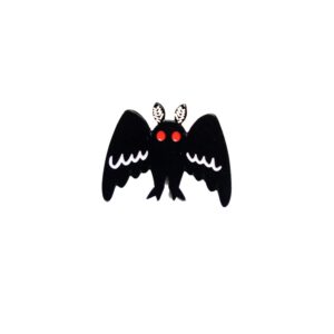 Mothman big wings enamel pin with black wings wide open and red eyes.