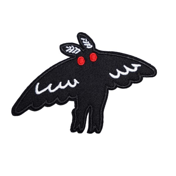 Mothman flight patch in black and white with red eyes.