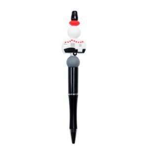 Vintage RV Black writing pen in white, red, and black.