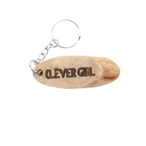 Jurassic Park Driftwood Keychain. “Clever girl.” front quote and Manawaiopuna Falls, Hawaii filming location of Jurassic Park longitude and latitude “21.9914° N, 159.5286° W” on the back. 